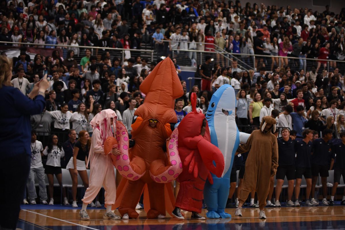 Students dressed in sea creature costumes to reveal the Homecoming theme during the pep rally on Friday, Aug. 30.