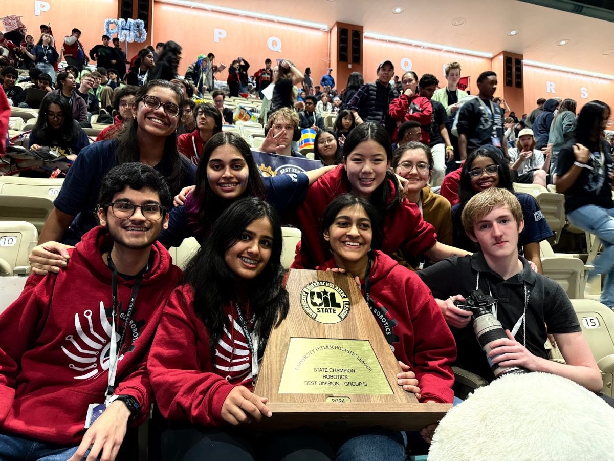 Robotics team with their first place award from the state championship on Saturday, Dec. 8, 2024.